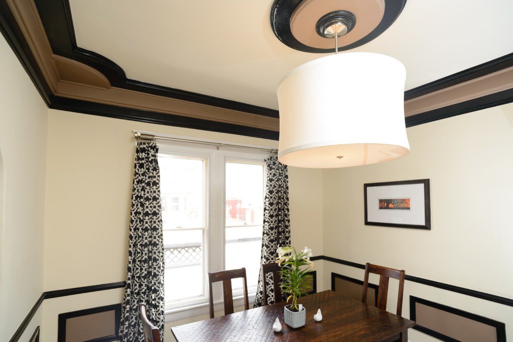 Small white hardwood dining room